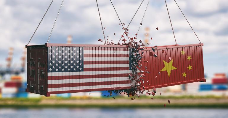 Chinese and US shipping containers smashing into one another